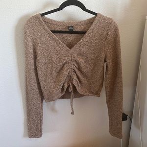 Super cute and fashionable cropped lightweight sweater with scrunch detail